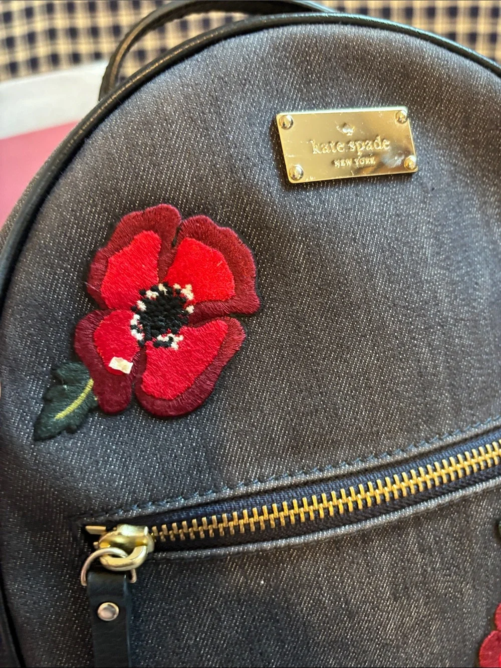 kate spade Grove Street Poppy Dark Denim Mini Backpack with Red Floral Appliqués